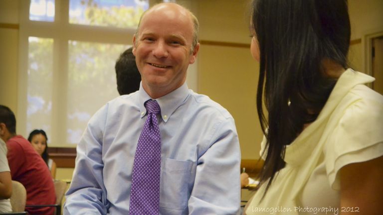 McGeorge professor, and Director of McGeorge's Immigration Clinic, Blake Nordahl with students