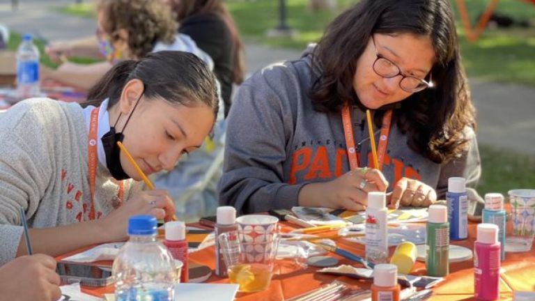 students painting