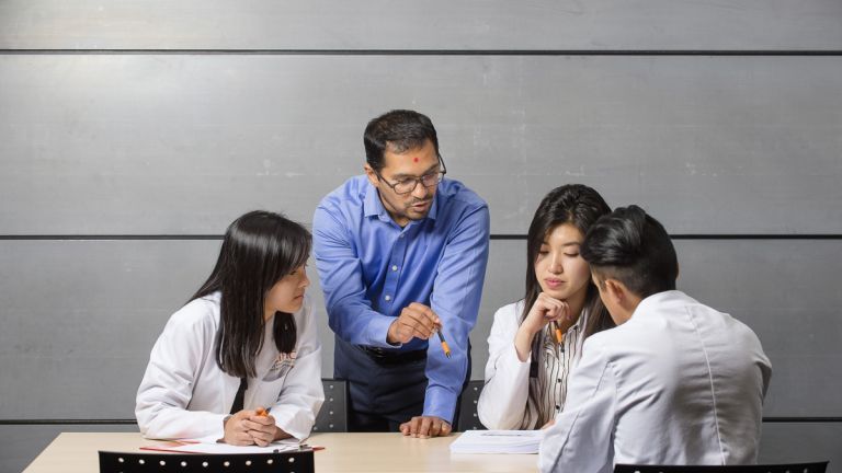 Sachin Shah with PharmD students in classroom