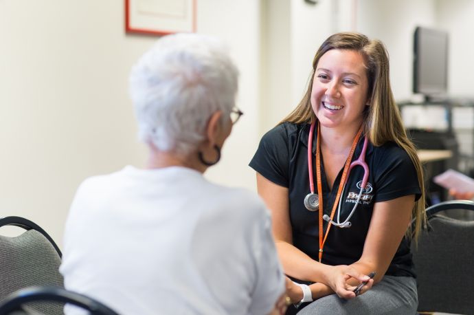 a student working with a patient