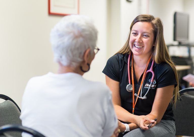 a student working with a patient