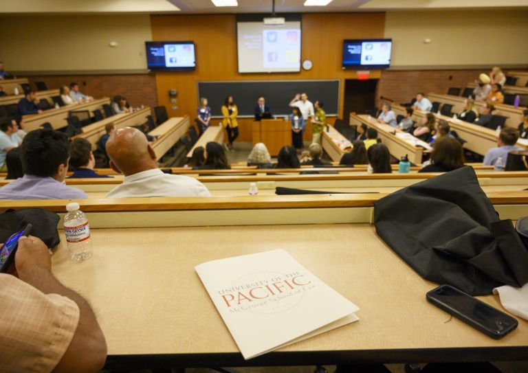 students in a classroom during orientation