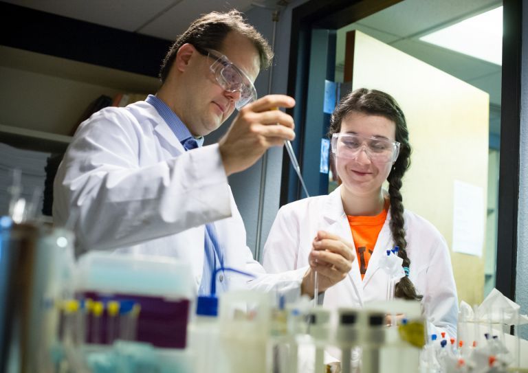 Student and professor in lab