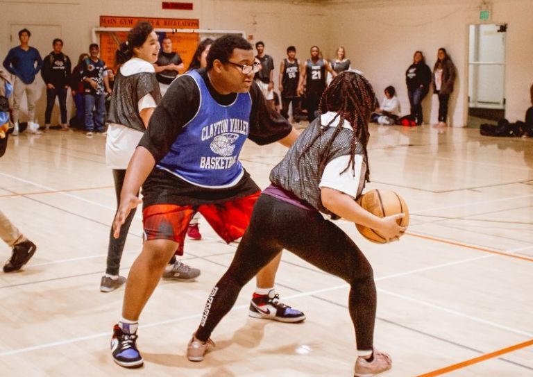 pacific students playing basketball