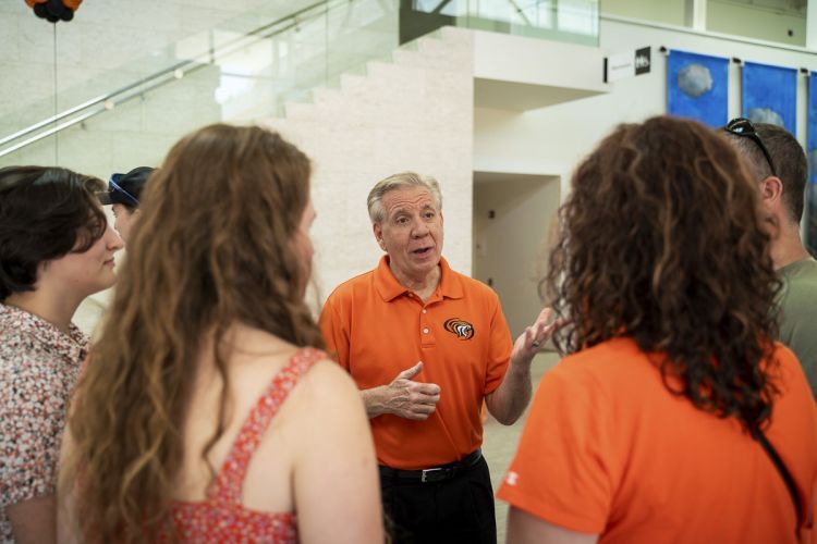 President Callahan greeting students