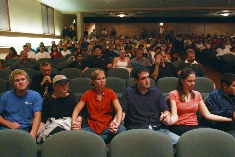 Pacific students holding hands