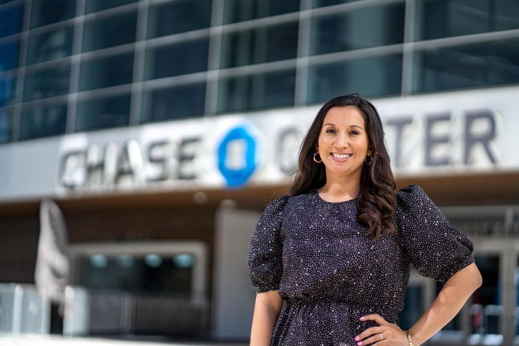 Nicole Barbour stands in front of Chase Center