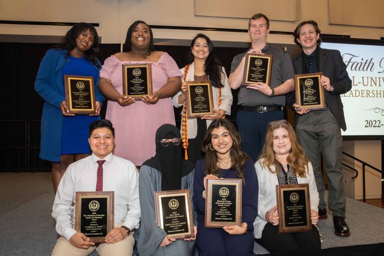 award recipients pose for a photo