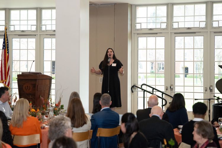 Music performance major Kailey Diggs performs "Climb Every Mountain."