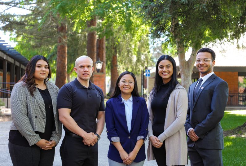 Five law students pose for a picture.