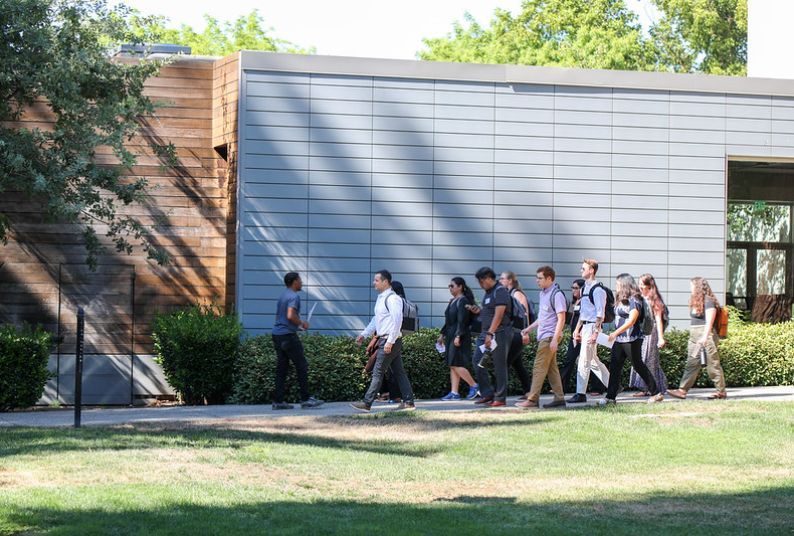 Law students go on a walking tour of campus.