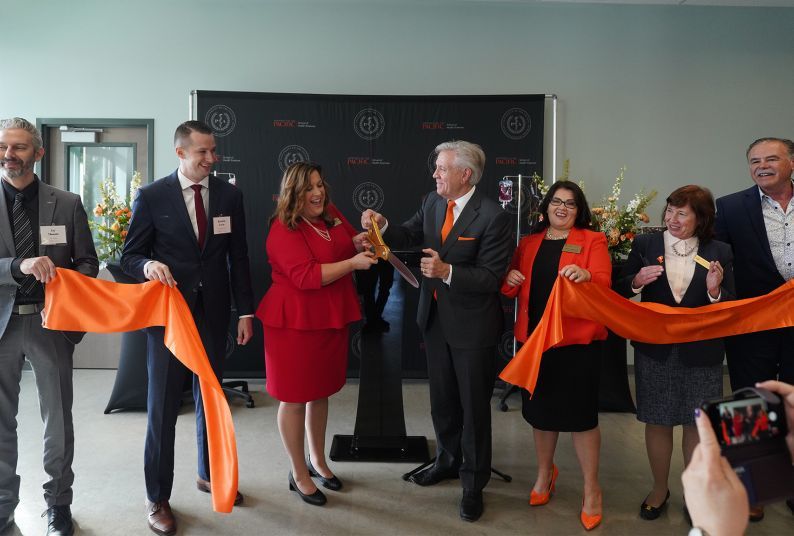 A ribbon-cutting ceremony is held to open the new Center for Physician Assistant Education.