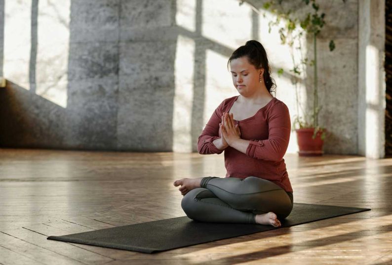 Photo by Cliff Booth: https://www.pexels.com/photo/photo-of-woman-meditating-alone-4056968/