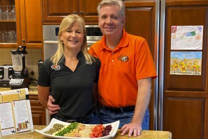 President Christopher Callahan, right, with his wife Jean Callahan.