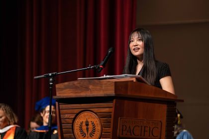 A student speaks at a podium