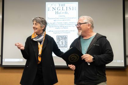 Maria Pallavicini stands with Ken Albala at the front of a classroom