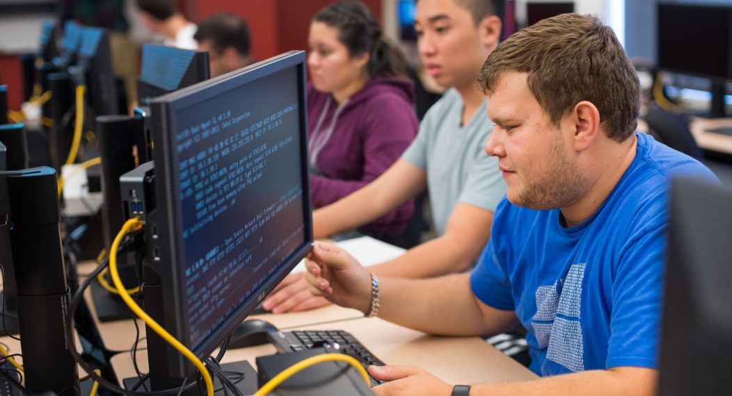 Students working on code.