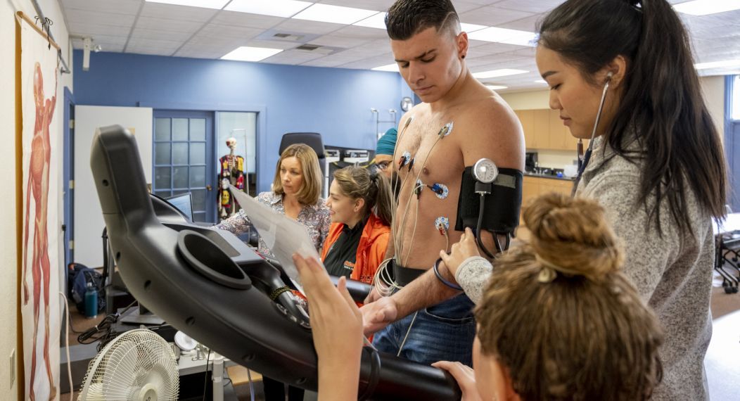 Student taking cardiac stress test