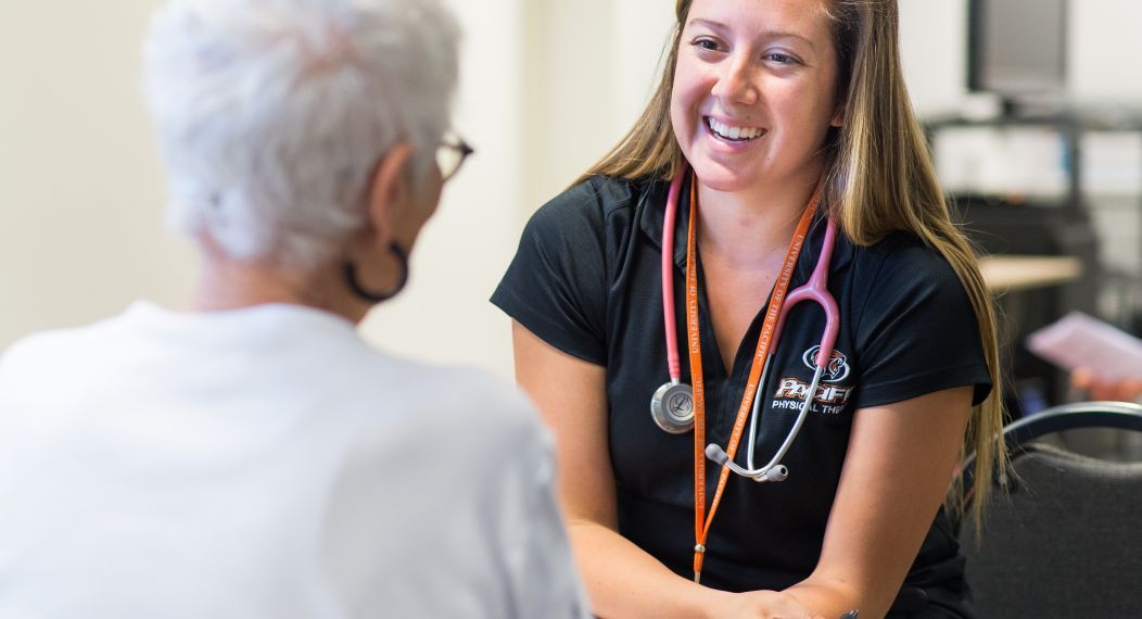 a student working with a patient