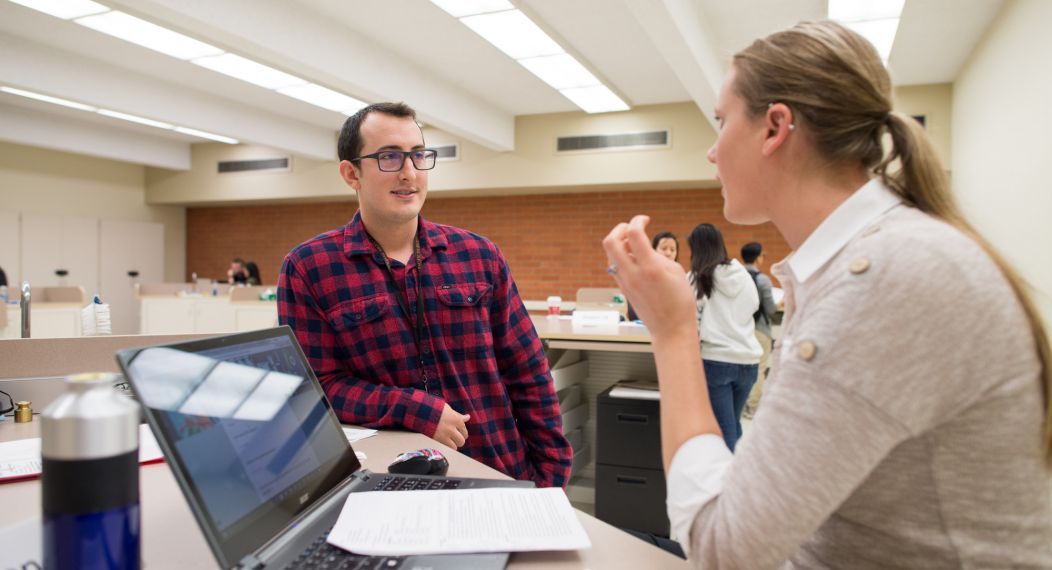 two students converse