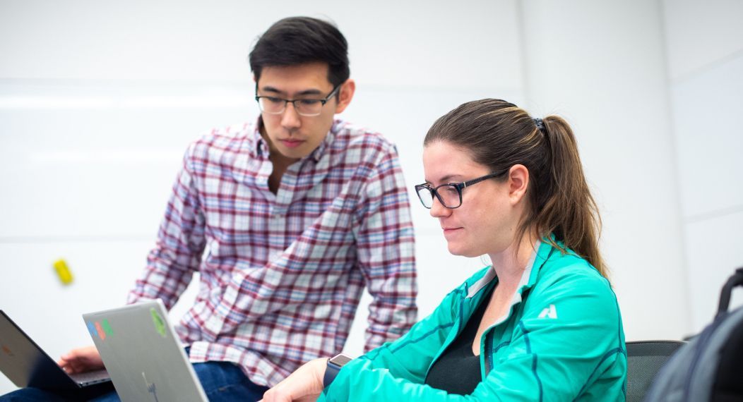 students at laptop