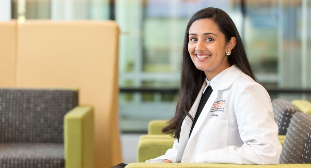 Audiology student sitting in lobby