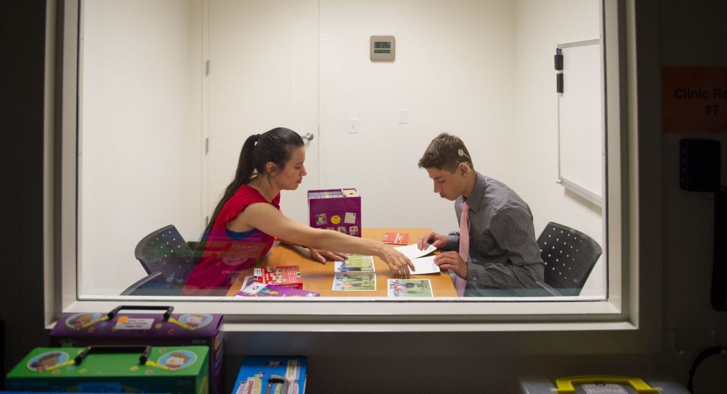 SLP student working with patient