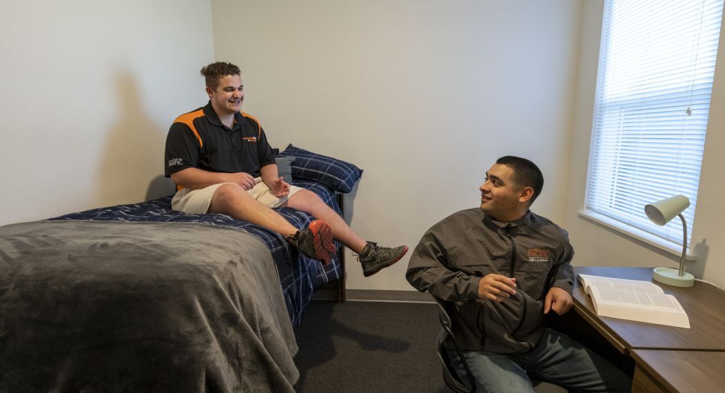 students in dorm room