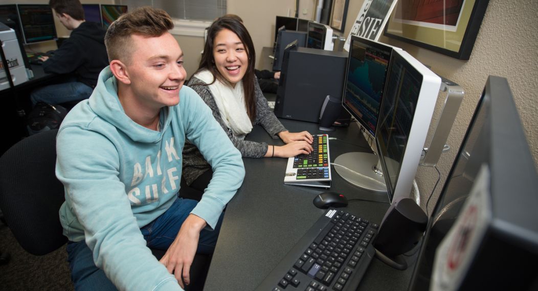 students analyzing data at a computer