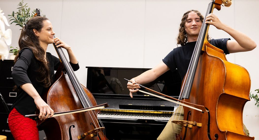 Professor Kathryn Schulmeister and her student during a double bass lesson