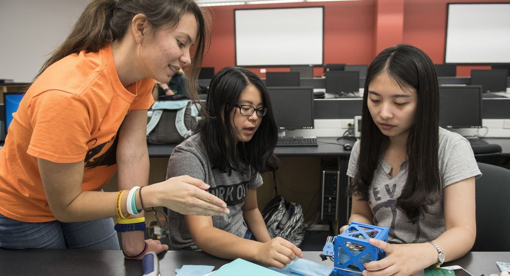 Students building a device