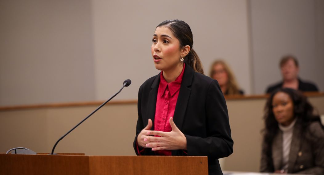 woman standing at a podium