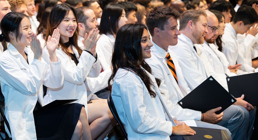 students reciting oath at the White Coat Ceremony