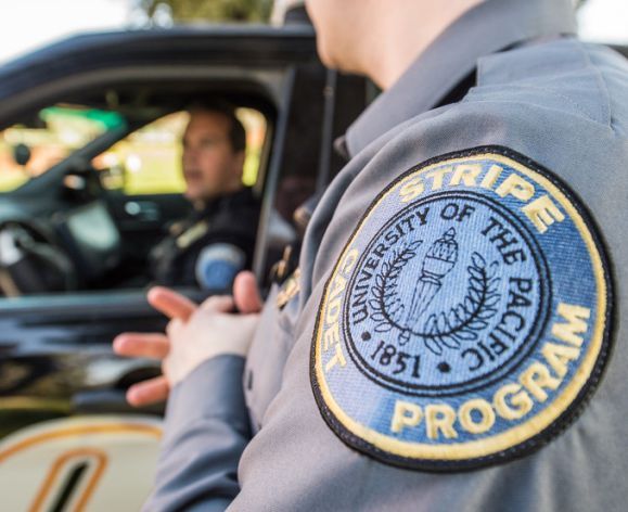 a STRIPE cadet talks to a public safety officer