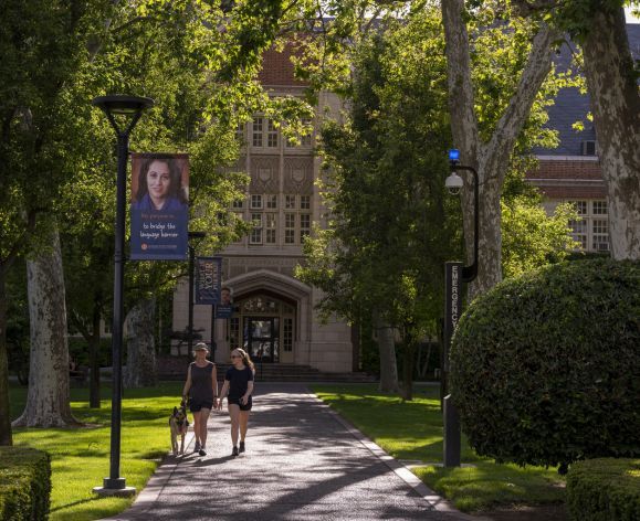 people walking around beautiful campus