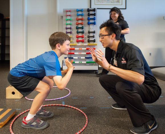 PT student working with child in clinic