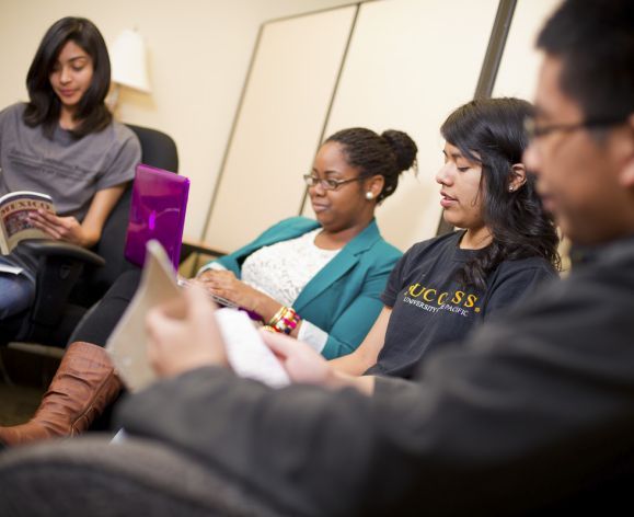 four students studying