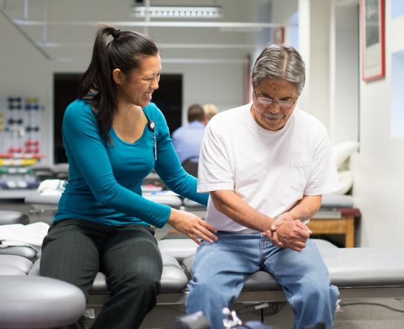 student working with patient